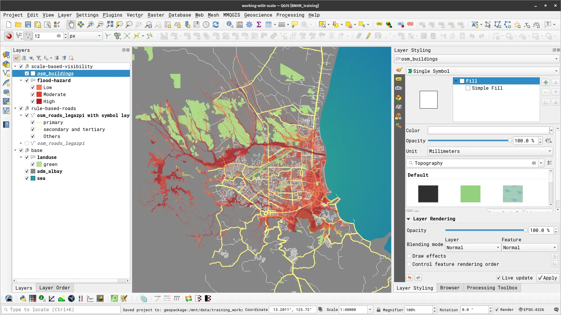  At 1:40,000 scale, notice that the osm_buildings layer does not appear on the map canvas even if it should be visible